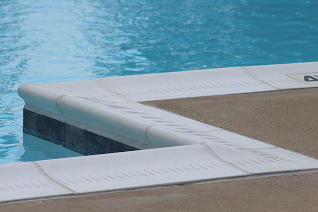 Precast eased edge coping pool deck — Pool Life Greenville SC